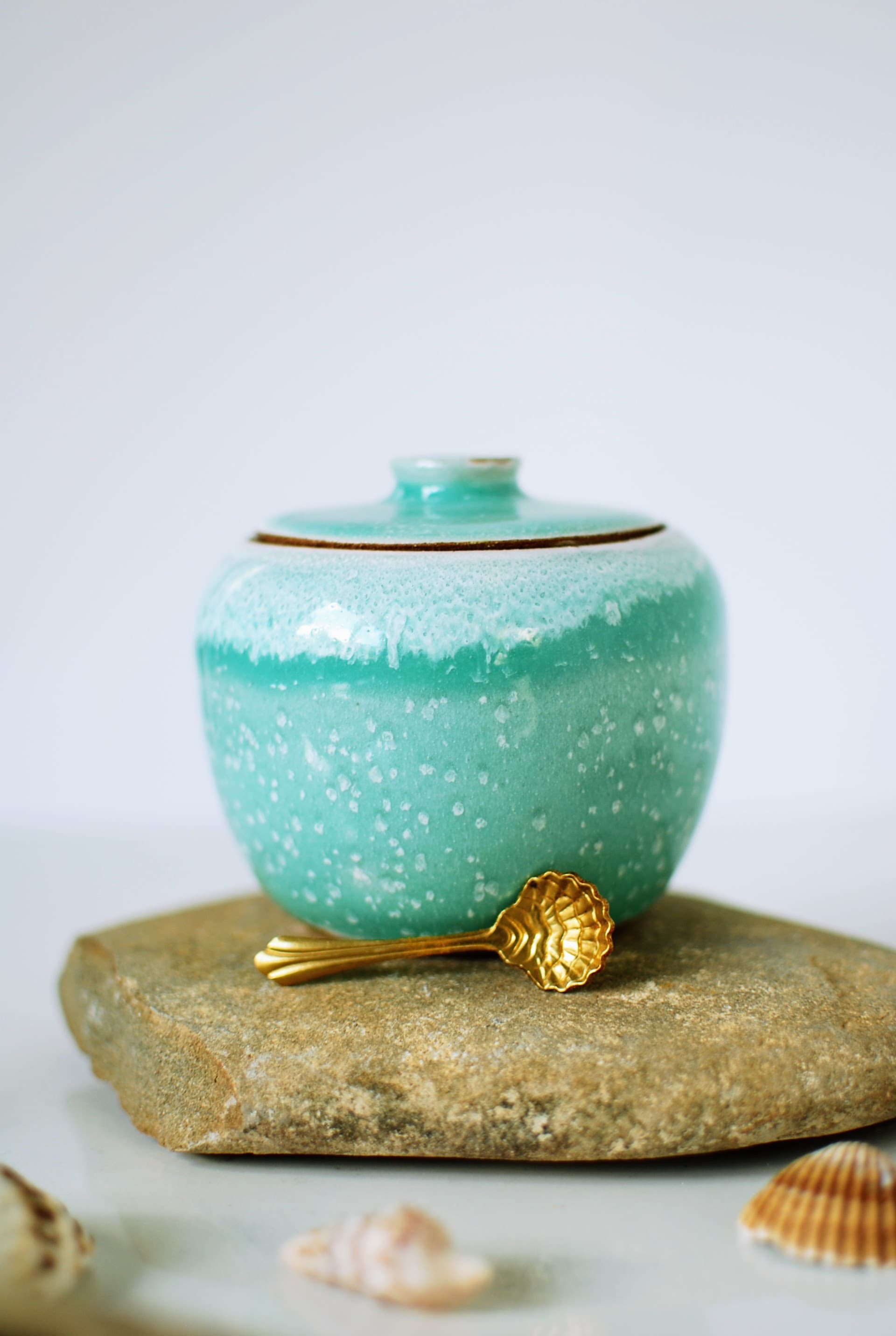 Handmade turquoise speckled ceramic sugar jar with lid and stainless steel spoon from the Maguelone collection by Studio Lippi Ceramics, Dublin, Ireland.